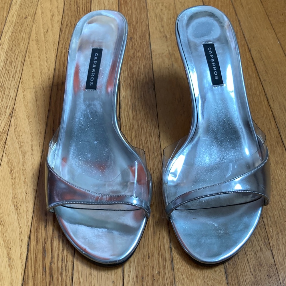 Caparros Metallic Silver Heels Mules with clear plastic band size 9B.